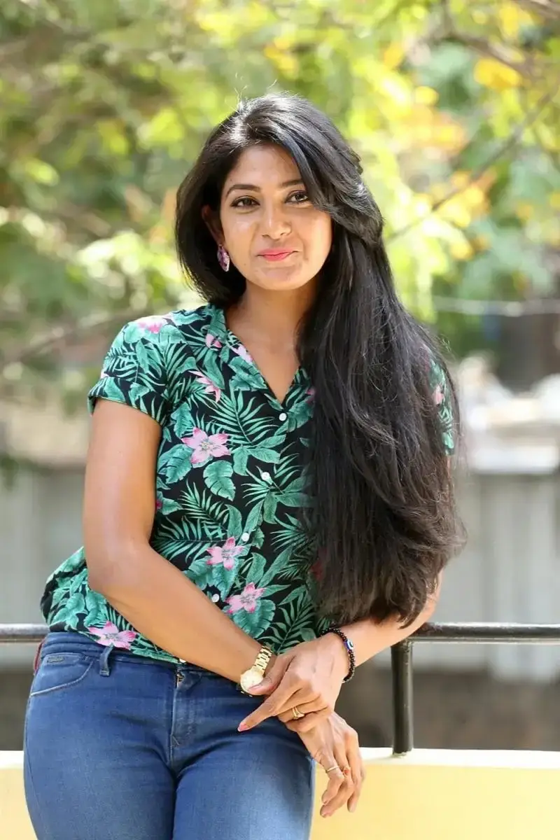 Telugu Actress Yagna Shetty Long Hair Blue Jeans Stills